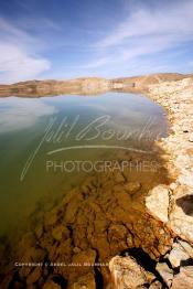 Image du Maroc Professionnelle de  Le barrage Laghrasse "dit barrage Hassan II", il se situe à 50 km au sud est de Taourirte au nord du Maroc, Samedi 10 Février 2006, ce barrage fournit en eau potable  le barrage Mohammed V qui sert de lien pour Machraa Hammadi,  ce dernier permet l'approvisionnement des centre de Taourirte et El Aïoun Sidi Mellouk. (Photo / Abdeljalil Bounhar)